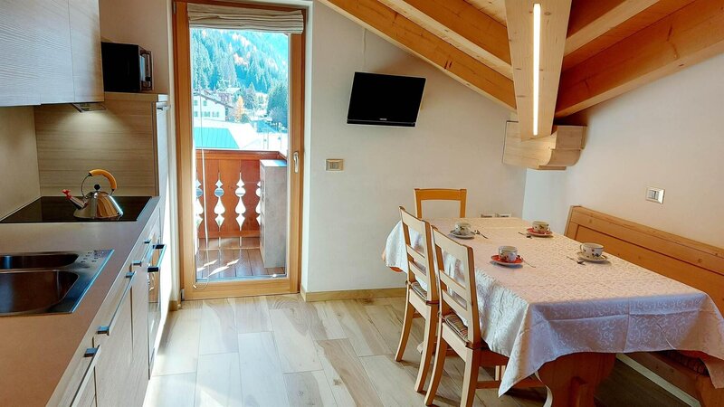 soggiorno angolo cottura