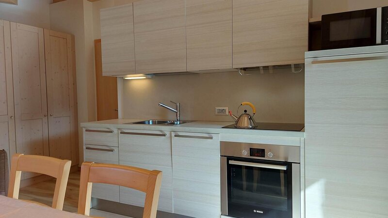 soggiorno angolo cottura