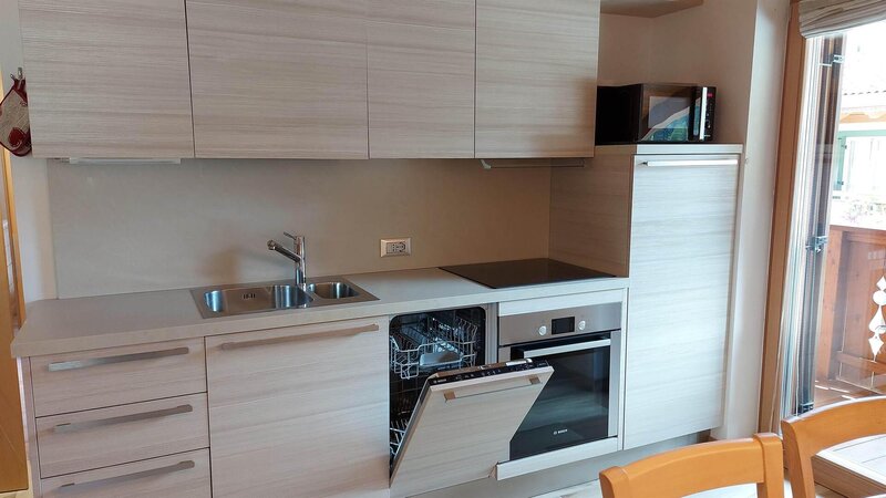 soggiorno angolo cottura